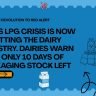 Indian dairy worker operating LPG-fired pasteurisation boiler at milk processing plant 2026
